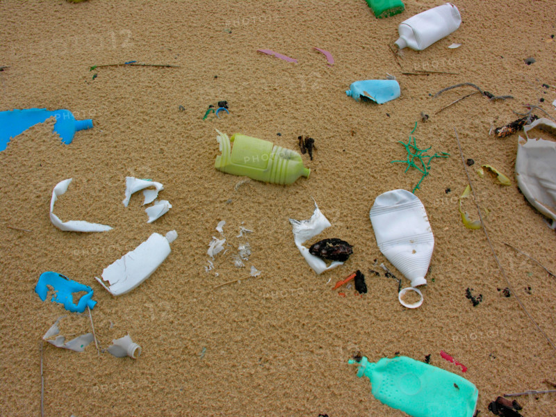 trash rubbish in sand at the beach of Atlantic ocean in France
