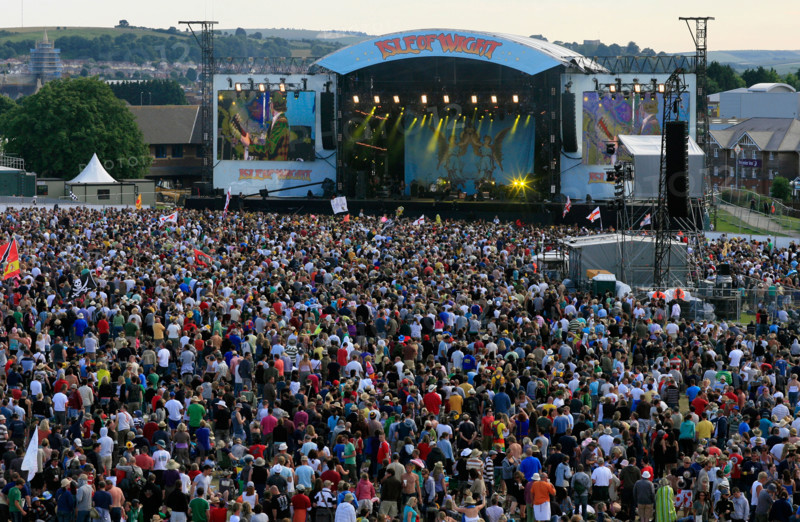 Crowds gather around the main stage at the 2008 Isle of Wight Festival in Newport on the Isle of Wight.