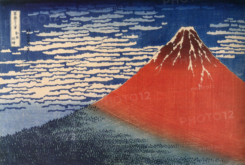 Katsushika Hokusai’s famous woodblock print 'Red Fuji' portrays Mount Fuji against a vibrant red sky. This iconic piece from Hokusai’s 'Thirty-Six Views of Mount Fuji' series captures the grandeur of the mountain with a bold and striking color contrast, exemplifying Hokusai’s masterful printmaking.