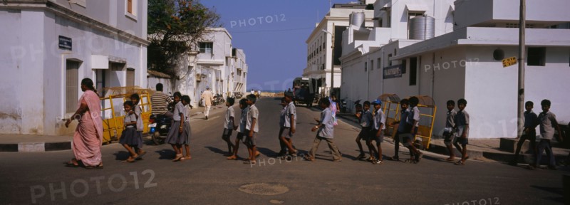 School children crossing the road, Pondicherry, India