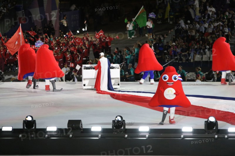 Quentin Lepoutre, better known as DJ Myd performing, along with The Phryges (official mascots) at the opening ceremony of the 2024 Paralympic games on the 28th August 2024 in the Place De La Concorde, Paris, France.