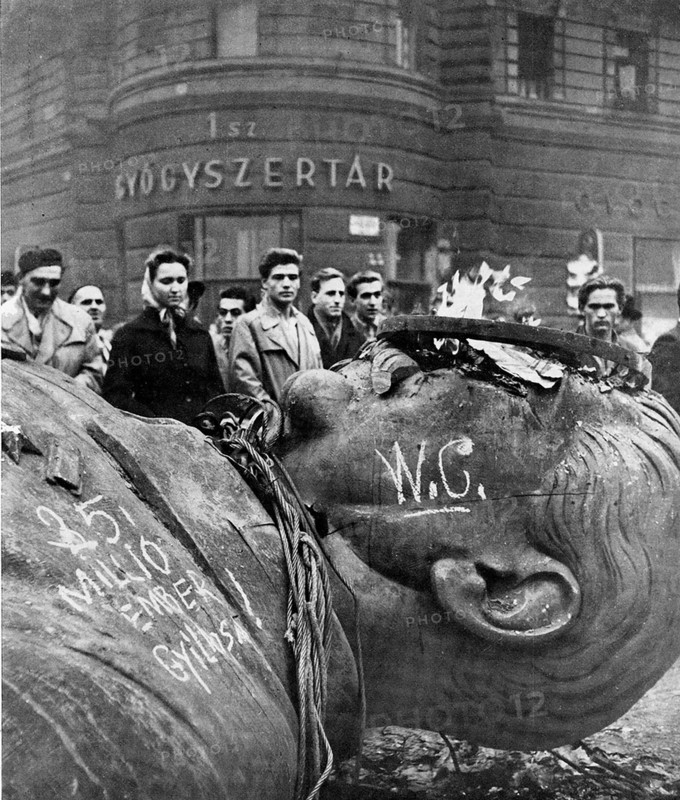 Fallen statue of Stalin in Budapest during the 1956 Hungarian Uprising