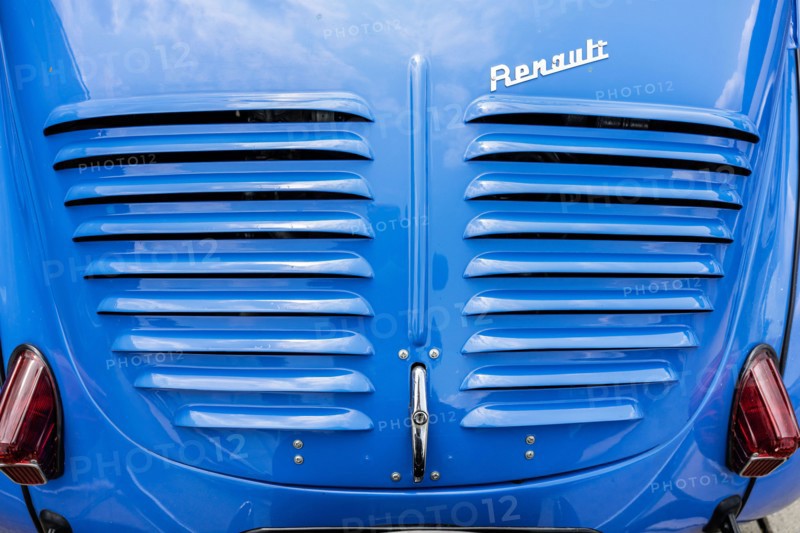 LINTHE, GERMANY - JUNE 08, 2025: Rear detail of a Renault 4CV (1954–1961), engine cover with vents and Renault script badge. Die Oldtimer Show.