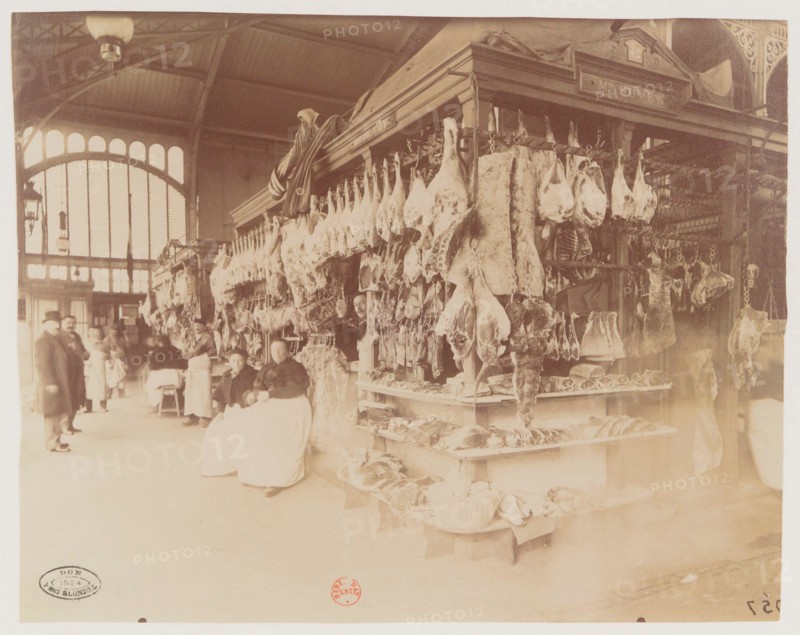 Les Halles, Paris, interior view of a butcher's shop, by Eugène Atget, a French photographer, between 1898 and 1924.
