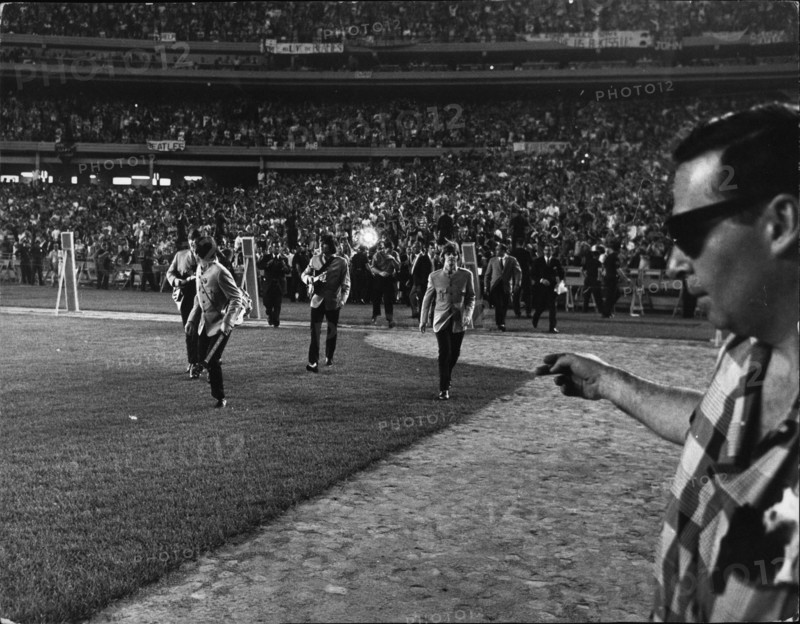 Aug. 08, 1966 - Never before have entertainers used a stadium which normally holds 60,000 plus sportsfans, but when the Beatles went to now America only the largest stage available would do, so they rented the Shea stadium, New York. And they filled it right up to every available seat. There the famous four confronts their audience - a howling, shrieking waving ecstatic mob of bos and girls and some not so young came to pay homage to the greatest of the pop singers. (Credit Image: © Keystone Press Agency/Keystone USA via ZUMAPRESS.com)