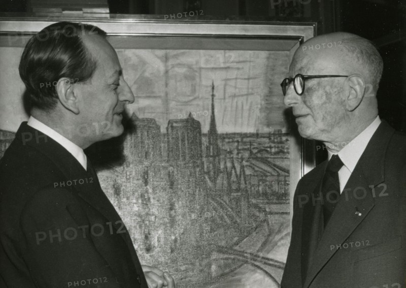 French painter Marcel Gromaire (right) shaking hands with Minister Andre Malraux, France 1959