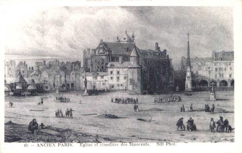 Press photograph reproduces Ancien Paris view of the Church of the Saints-Innocents and the Cemetery of the Innocents in Paris, presenting the former burial site and church complex as part of historic urban memory in central Paris.