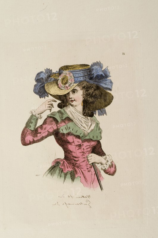 Femme coiffée du chapeau au tournesol