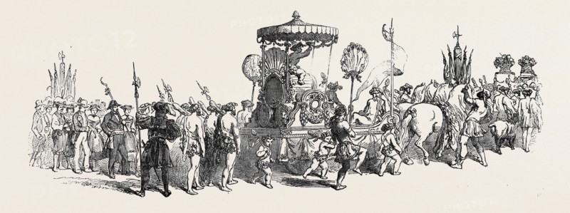 LA FETE DES VIGNERONS, AT VEVEY: THE PEOPLE WALKING ON THE LEFT REPRESENT WINTER; IN THE CENTRE CAN BE SEEN THE CAR OF BACCHUS AND PEOPLE REPRESENTING AUTUMN