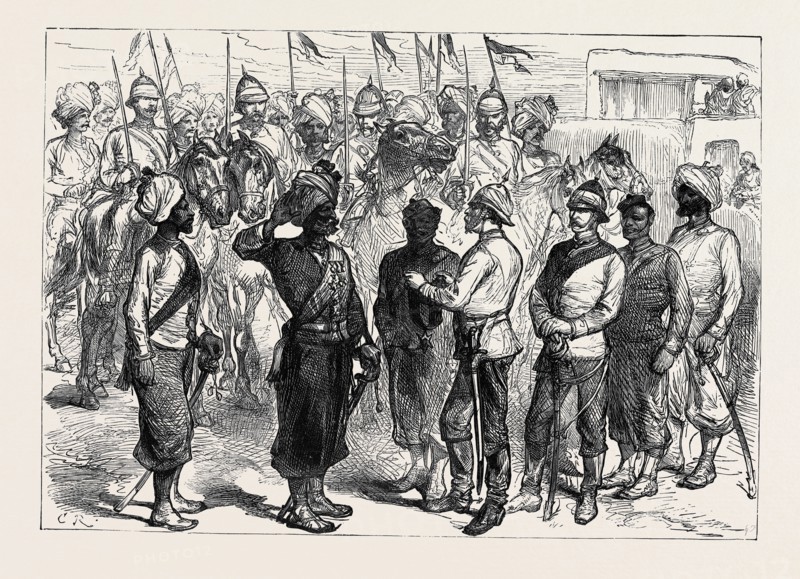 THE AFGHAN WAR: DECORATING A NATIVE SOLDIER WITH THE ORDER OF BRITISH INDIA, AT KHELAT-I-GHILZAI, 1879
