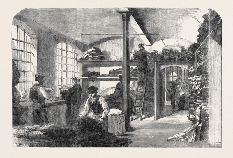 THE COTTON FAMINE: RECEIVING CLOTHES AT BRIDEWELL HOSPITAL, LONDON, FOR THE DISTRESSED OPERATIVES, 1862