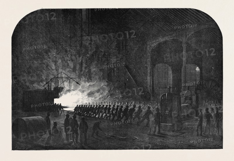 PROCESS OF ROLLING ARMOUR PLATES FOR HER MAJESTY'S SHIPS AT THE ATLAS STEELWORKS, SHEFFIELD