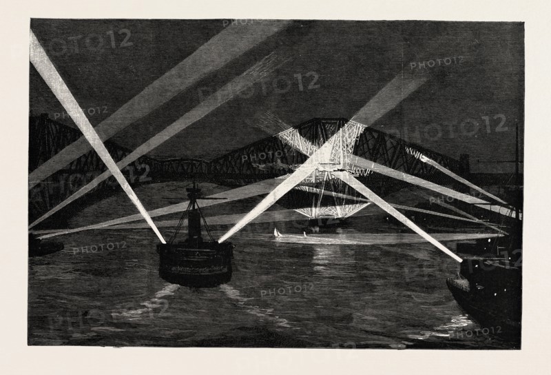 THE NAVAL MANOEUVRES, WITH THE NORTHERN FLEET: THE SHIPS SEARCHING THE FORTH BRIDGE WITH THE ELECTRIC LIGHT