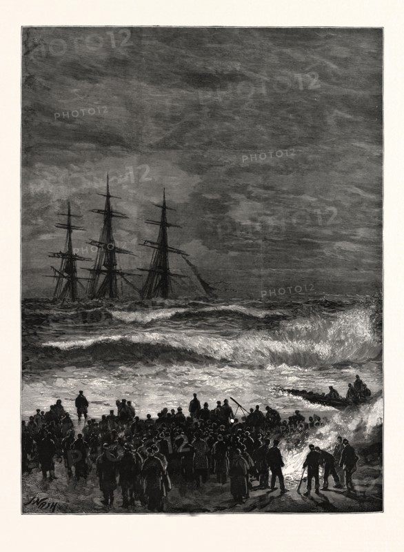 THE WRECK OF THE THREE-MASTED SHIP "BENVENUE" AT SANDGATE: When night came on a bonfire was lighted on the beach by the crowds who were watching the wreck, to cheer those of the unfortunate crew who were still clinging to the rigging