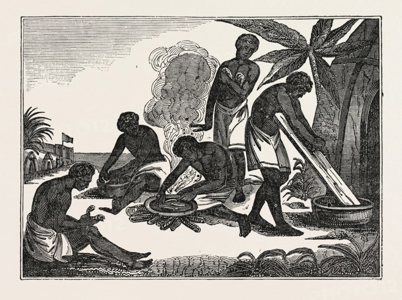 NATIVES OF MADAGASCAR PREPARING BREAD FROM THE MANIOC ROOT