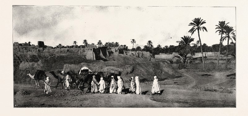 A CARAVAN APPROACHING AN OLD FORT IN BISKRA, engraving 1890