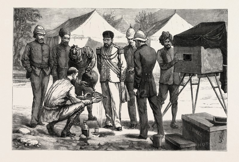 FIXING THE NEGATIVE, MR. BURKE POSING THE AMEER, THE AMEER YAKOOB KHAN AT GANDAMAK, AFGHAN WAR, engraving 1882