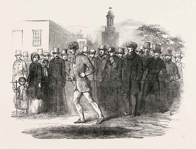 RICHARD MANKS, THE PEDESTRIAN COMPLETING HIS THOUSANDTH MILE, ON KENNINGTON OVAL, UK