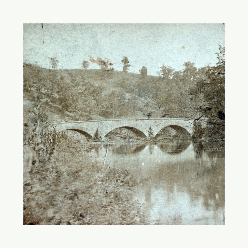 American Civil War: Antietam Bridge, on Sharpsburgh and Boonsboro Turnkpike, a stone bridge over a river. Photo, albumen print, By Alexander Gardner, 1821 1882, Scottish photographer who emigrated to the United States in 1856. From Gardner Photographic Art Gallery, Seventh Street, Washington