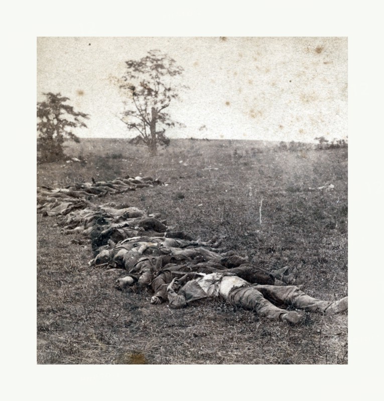 American Civil War: Gathered together for burial after the Battle of Antietam, dead bodies on the ground. Photo, albumen print, By Alexander Gardner, 1821 1882, Scottish photographer who emigrated to the United States in 1856. From Gardner Photographic Art Gallery, Seventh Street, Washington