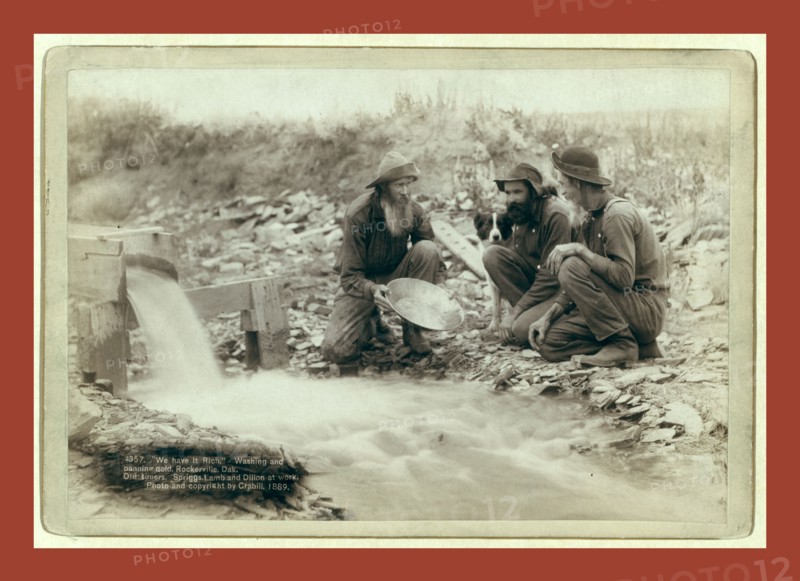We have it rich. Washing and panning gold, Rockerville, Dak. Old timers, Spriggs, Lamb and Dillon at work, John C. H. Grabill was an american photographer. In 1886 he opened his first photographic studio