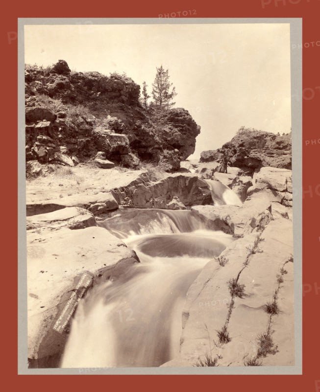 Minnekahta Falls. Near Hot Springs, Dak., John C. H. Grabill was an american photographer. In 1886 he opened his first photographic studio