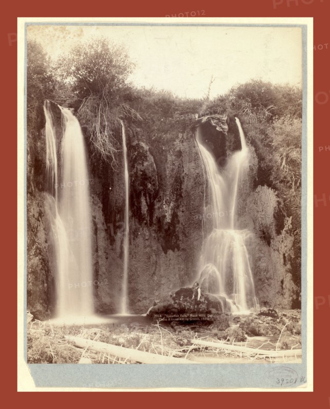 Spearfish Falls. Black Hills, Dak., John C. H. Grabill was an american photographer. In 1886 he opened his first photographic studio