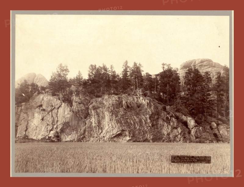 Calamity Peak. Near Custer, named after Calamity Jane, the most noted character in the Black Hills, John C. H. Grabill was an american photographer. In 1886 he opened his first photographic studio