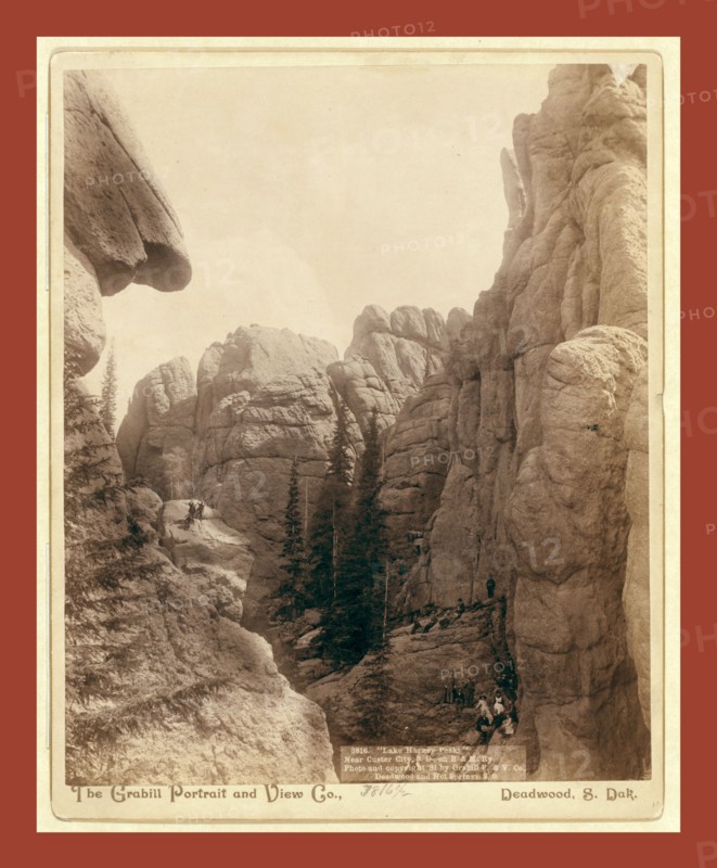 Lake Harney Peaks, near Custer City, S.D., on B. & M. Ry, John C. H. Grabill was an american photographer. In 1886 he opened his first photographic studio