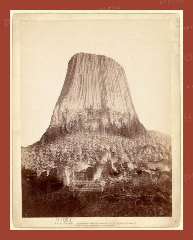Devil's Tower. From W[est] side showing millions of tons of fallen rock. Tower 800 feet high from its base, John C. H. Grabill was an american photographer. In 1886 he opened his first photographic studio