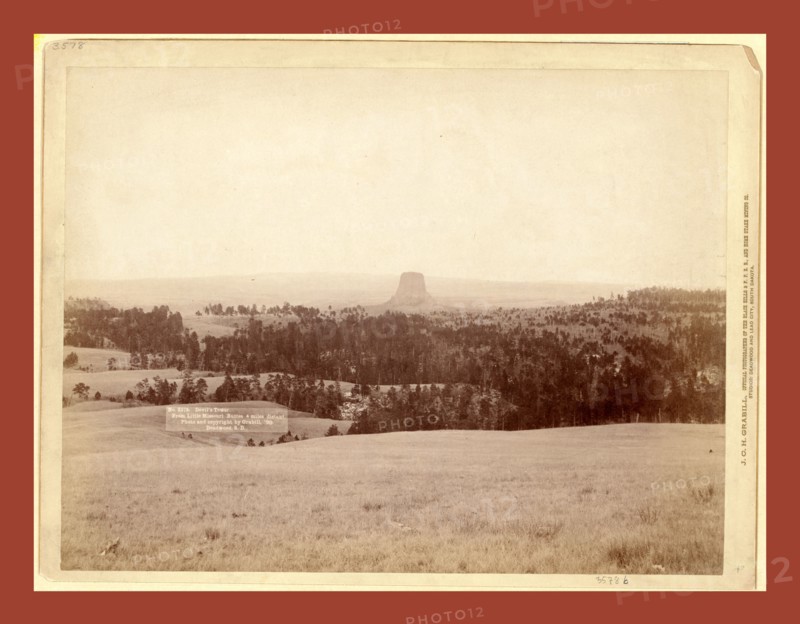 Devil's Tower. From Little Missouri Buttes 4 miles distant, John C. H. Grabill was an american photographer. In 1886 he opened his first photographic studio
