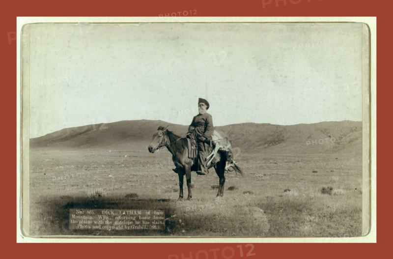 Dick Latham of Iron Mountain, Wyo., returning home from the plains with the antelope he has slain, John C. H. Grabill was an american photographer. In 1886 he opened his first photographic studio