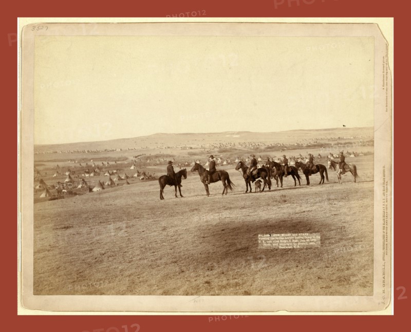 Gen. Miles and staff viewing the largest hostile Indian Camp in the U.S., near Pine Ridge, S. Dak., Jan 16, 1891, John C. H. Grabill was an american photographer. In 1886 he opened his first photographic studio