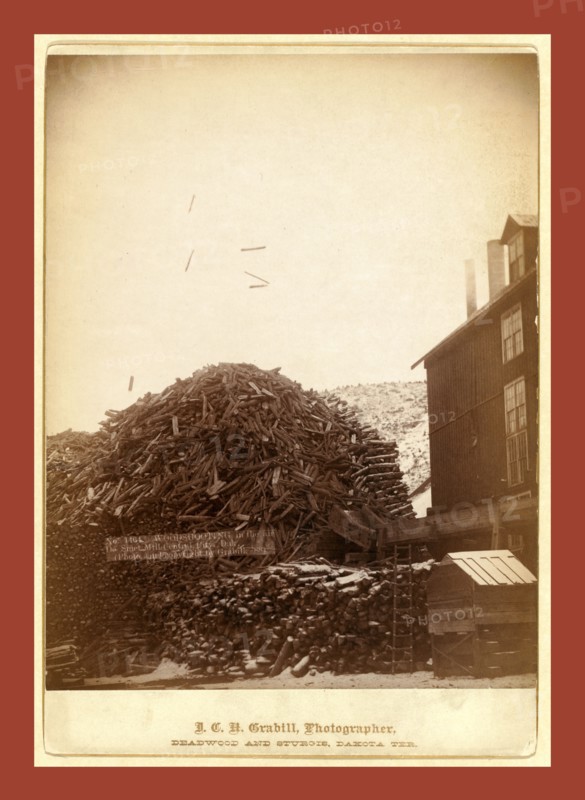 Wood shooting in the air, De Smet Mill, Center City, Dak., John C. H. Grabill was an american photographer. In 1886 he opened his first photographic studio