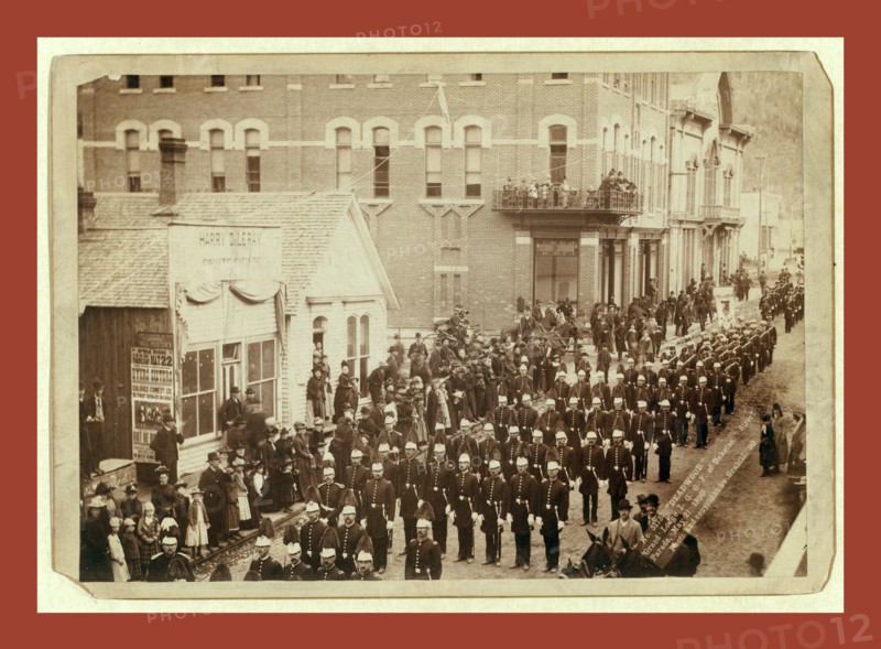 Deadwood. Grand Lodge I.O.O.F. of Dakotas. Street Parade, May 21, 1890, John C. H. Grabill was an american photographer. In 1886 he opened his first photographic studio