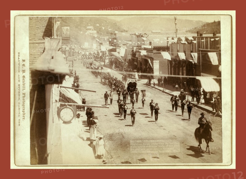 Celebrating. Deadwood people celebrating the building of the largest reduction works of the kind (for gold and silver ores) in the world, John C. H. Grabill was an american photographer. In 1886 he opened his first photographic studio