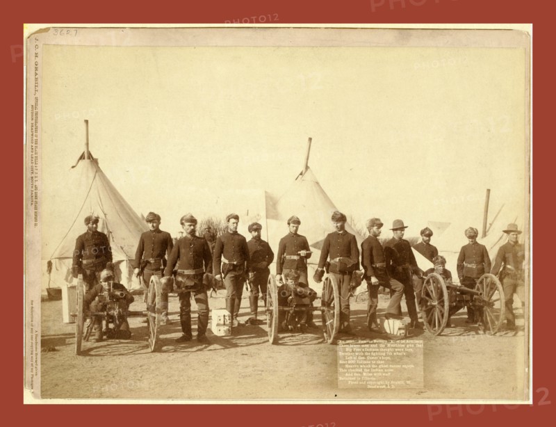 Famous Battery E of 1st Artillery. These brave men and the Hotchkiss gun that Big Foot's Indians thought were toys, together with the fighting 7th what's left of Gen. Custer's boys, sent 200 Indians to that Heaven which the ghost dancer enjoys. This checked the Indian noise and Gen. Miles with staff returned to Illinois, John C. H. Grabill was an american photographer. In 1886 he opened his first photographic studio