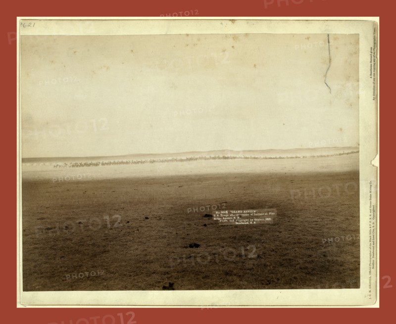 Grand review. U.S. troops after surrender of Indians at Pine Ridge Agency, S.D., John C. H. Grabill was an american photographer. In 1886 he opened his first photographic studio