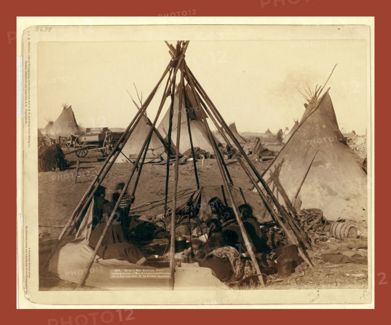 Home of Mrs. American Horse. Visiting squaws at Mrs. A's home in hostile camp, John C. H. Grabill was an american photographer. In 1886 he opened his first photographic studio