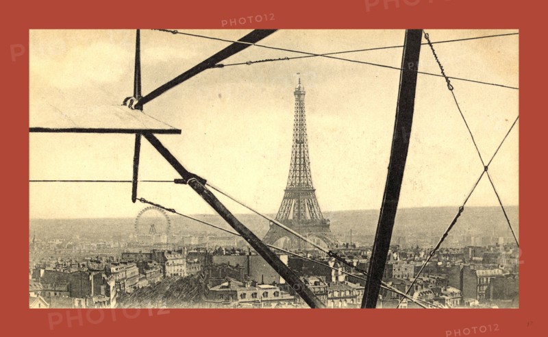 An aerial view of the Eiffel Tower in Paris, seen through the framework of a biplane, France, between 1904 and 1914, E. Neurdein