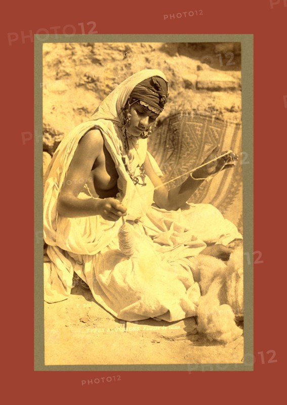 Types Algerians, wool spinner, Neurdein brothers 1860 1890, the Neurdein photographs of Algeria including Byzantine and Roman ruins in Tébessa and Thamugadi; mosques, shrines, public buildings, palaces, and street scenes in Mostaganem, Biskra, Algiers, Tlemcen, Constantine, Oran, and Sidi Bel AbbÃ¨s; and the cathedral at Carthage. Portraits of Algerian people include Berbers, Ouled NaÃ¯l women, and prisoners in Annaba. Tunisian views include mosques, buildings, and street scenes in Tunis.