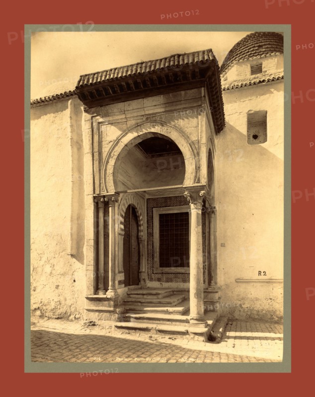 Tunis Gate College, Tunisia, Neurdein brothers 1860 1890, the Neurdein photographs of Algeria including Byzantine and Roman ruins in Tébessa and Thamugadi; mosques, shrines, public buildings, palaces, and street scenes in Mostaganem, Biskra, Algiers, Tlemcen, Constantine, Oran, and Sidi Bel AbbÃ¨s; and the cathedral at Carthage. Portraits of Algerian people include Berbers, Ouled NaÃ¯l women, and prisoners in Annaba. Tunisian views include mosques, buildings, and street scenes in Tunis.