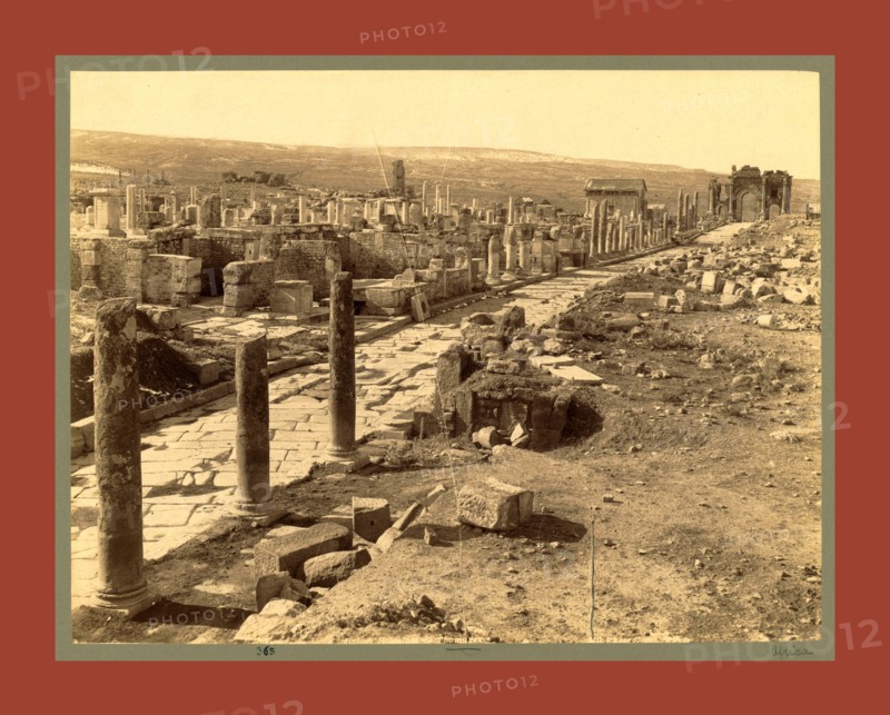 Roman ruins Thamugas, Algiers, Neurdein brothers 1860 1890, the Neurdein photographs of Algeria including Byzantine and Roman ruins in Tébessa and Thamugadi; mosques, shrines, public buildings, palaces, and street scenes in Mostaganem, Biskra, Algiers, Tlemcen, Constantine, Oran, and Sidi Bel AbbÃ¨s; and the cathedral at Carthage. Portraits of Algerian people include Berbers, Ouled NaÃ¯l women, and prisoners in Annaba. Tunisian views include mosques, buildings, and street scenes in Tunis.