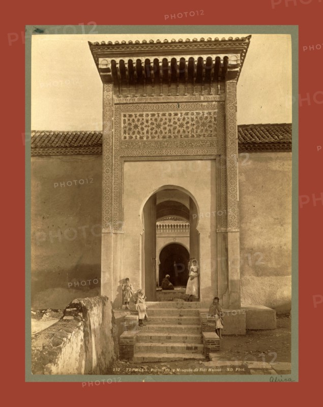 Tlemcen, Portal of the Mosque of Sidi Haloui, Algiers, Neurdein brothers 1860 1890, the Neurdein photographs of Algeria including Byzantine and Roman ruins in Tébessa and Thamugadi; mosques, shrines, public buildings, palaces, and street scenes in Mostaganem, Biskra, Algiers, Tlemcen, Constantine, Oran, and Sidi Bel AbbÃ¨s; and the cathedral at Carthage. Portraits of Algerian people include Berbers, Ouled NaÃ¯l women, and prisoners in Annaba. Tunisian views include mosques, buildings, and street scenes in Tunis.