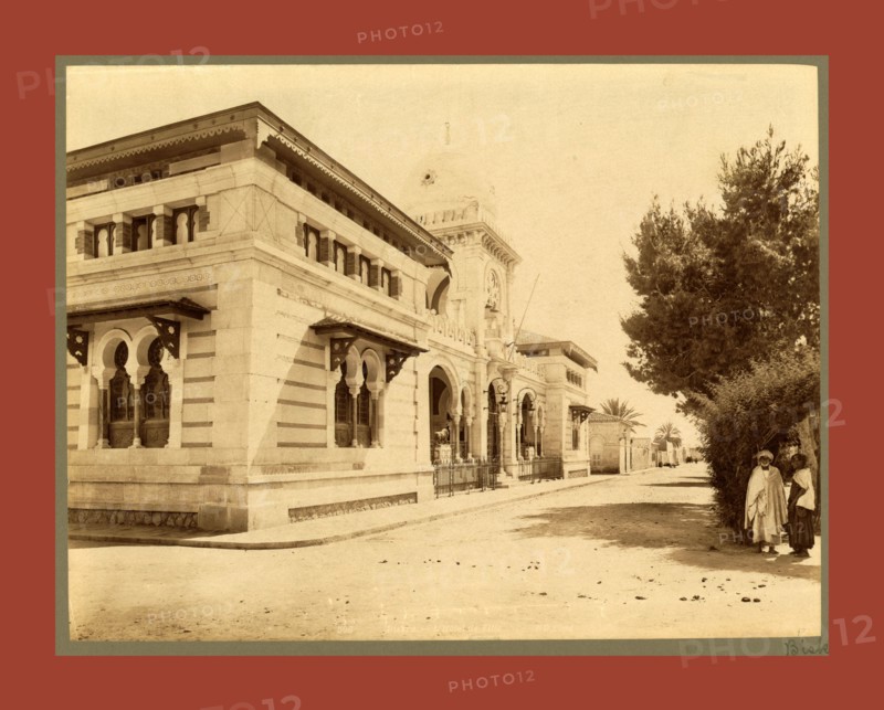 Biskra, Hotel de Ville, Algiers, Neurdein brothers 1860 1890, the Neurdein photographs of Algeria including Byzantine and Roman ruins in Tébessa and Thamugadi; mosques, shrines, public buildings, palaces, and street scenes in Mostaganem, Biskra, Algiers, Tlemcen, Constantine, Oran, and Sidi Bel AbbÃ¨s; and the cathedral at Carthage. Portraits of Algerian people include Berbers, Ouled NaÃ¯l women, and prisoners in Annaba. Tunisian views include mosques, buildings, and street scenes in Tunis.