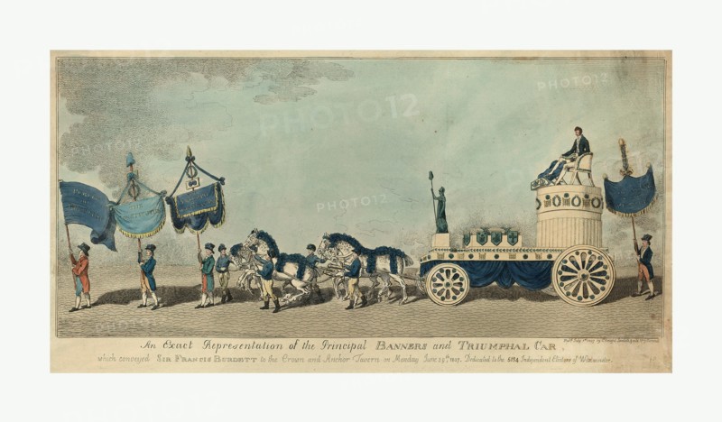An exact representation of the principal banners and triumphal car, which conveyed Sir Frances Burdett to the Crown and Anchor Tavern on Monday June 29th, 1807 - dedicated to the 5134 independent electors of Westminster, engraving 1807 July, three men with banners leading a four-horse team drawing a carriage with a statue of Britannia holding a staff topped with a liberty cap, two fasces on a low platform, and Sir Frances Burdett sitting in a chair atop a short column, another man with a banner follows behind the carriage.