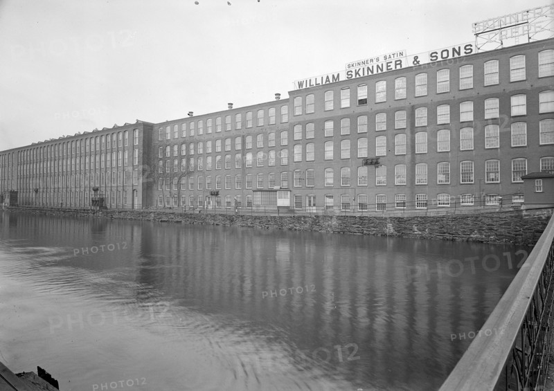 Mt. Holyoke, Massachusetts - Scenes. The Canal: the best tradition of a home industry; founded elsewhere and emigrating twice, here after a broken dam washed away the original mill and town; family owned, to second and third generation, long established sales outlets developed on par with manufacturing; seven cycles of product. William Skinner and Sons, 1936, Lewis Hine, 1874 - 1940, was an American photographer, who used his camera as a tool for social reform. US,USA