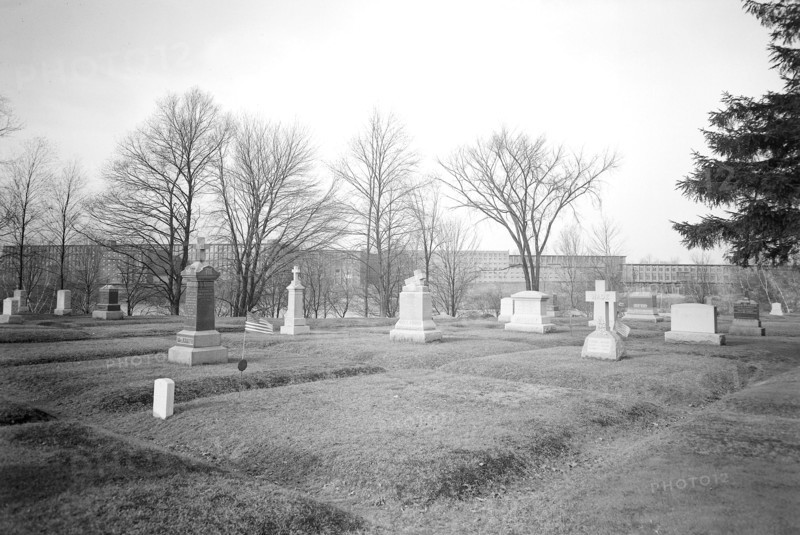 Mt. Holyoke, Massachusetts - Scenes. West Boylston Manufacturing Company from St. Brigid's Cemetary, 1936, Lewis Hine, 1874 - 1940, was an American photographer, who used his camera as a tool for social reform. US,USA