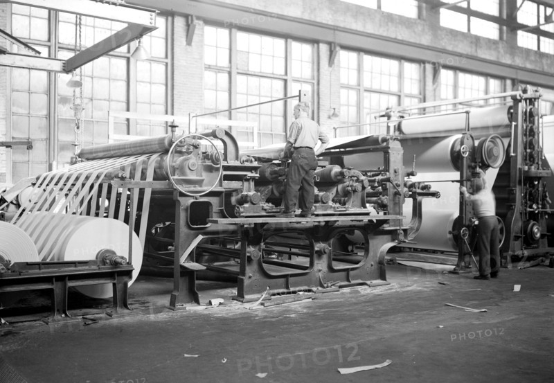 Mt. Holyoke, Massachusetts - Paper. American Writing Paper Co. Cylinder machine (making matchboard), 1936, Lewis Hine, 1874 - 1940, was an American photographer, who used his camera as a tool for social reform. US,USA