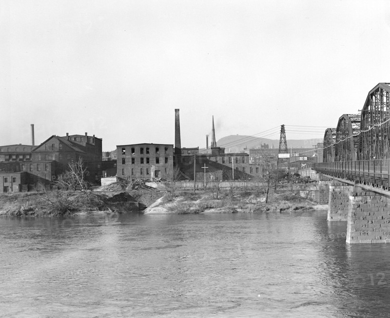 Mt. Holyoke, Massachusetts - Scenes. Plants of the pristine industries of the River-side, now housing textile and paper converting and accessories, 1936, Lewis Hine, 1874 - 1940, was an American photographer, who used his camera as a tool for social reform. US,USA